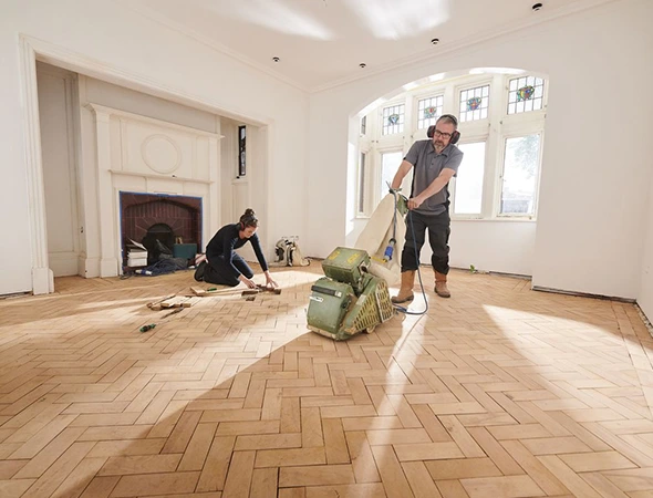 Skilled flooring professional installing vinyl and tile floors in Concord NC